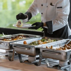 catering-staff-serves-food-buffet-600nw-2630302985